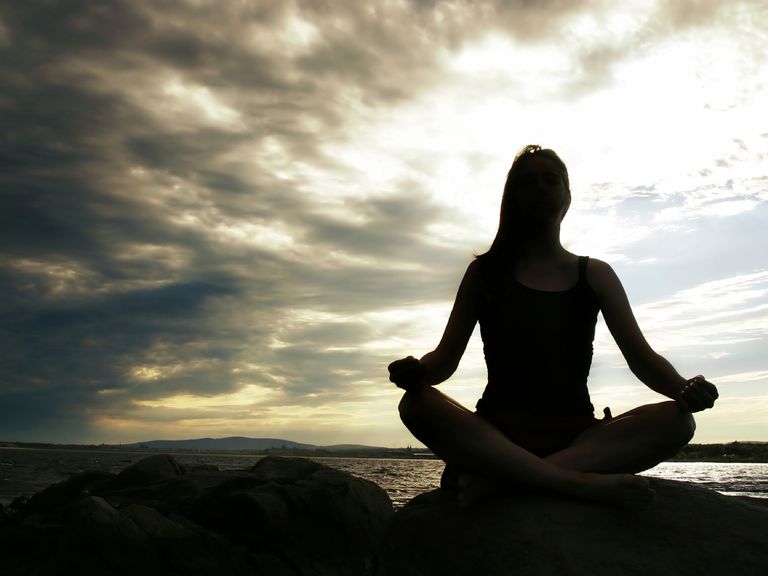 girl in lotus position meditating